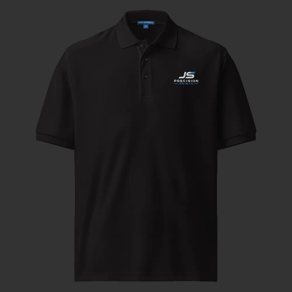 Black polo shirt with a logo on the chest against a white background